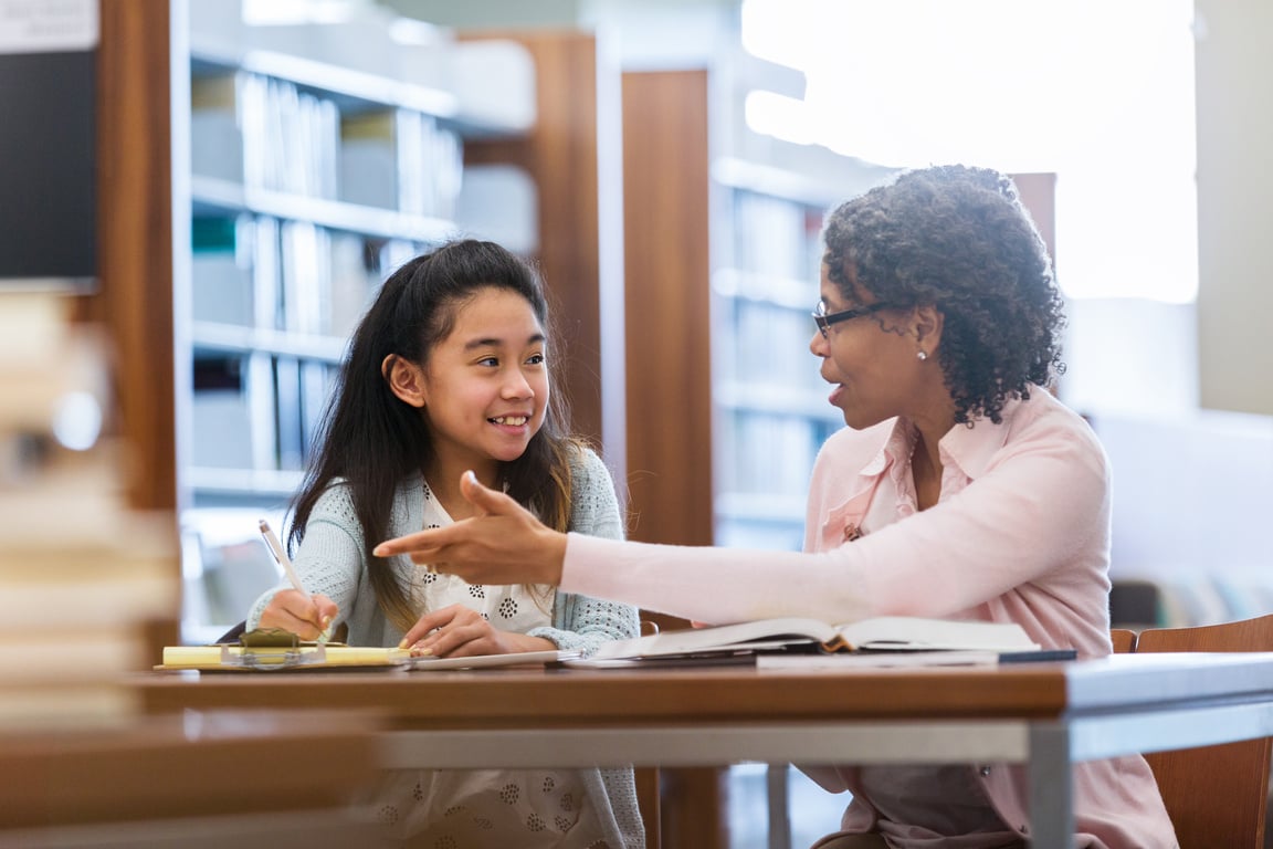 Elementary age girl receives help from mentor